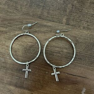 Beautiful gold earrings with cross